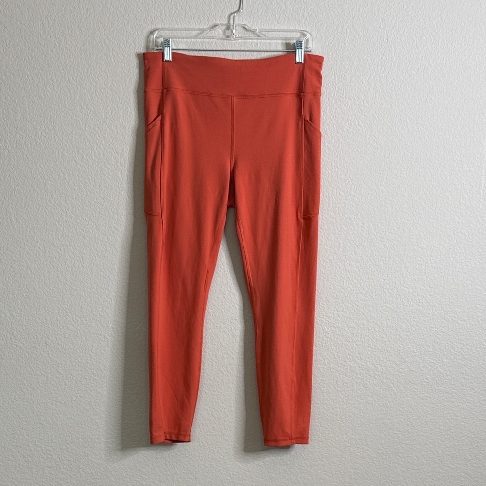 Lululemon Invigorate High Rise tight in brick women’s 12